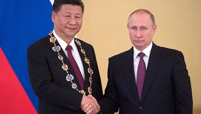 Foto: Putin Xitoy rahbarini mukofotladi