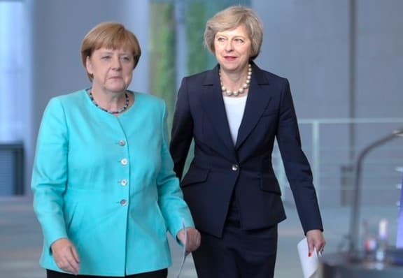 Merkel va Mey Trampning migratsiya siyosatini tanqid qilishdi