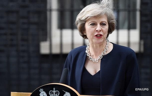 Mey Britaniyaga keluvchi muhojirlar sonini qisqartirmoqchi