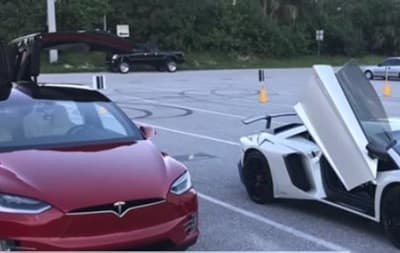 Tesla elektromobili Lamborghini poyga mashinasini ortda qoldirdi (video)