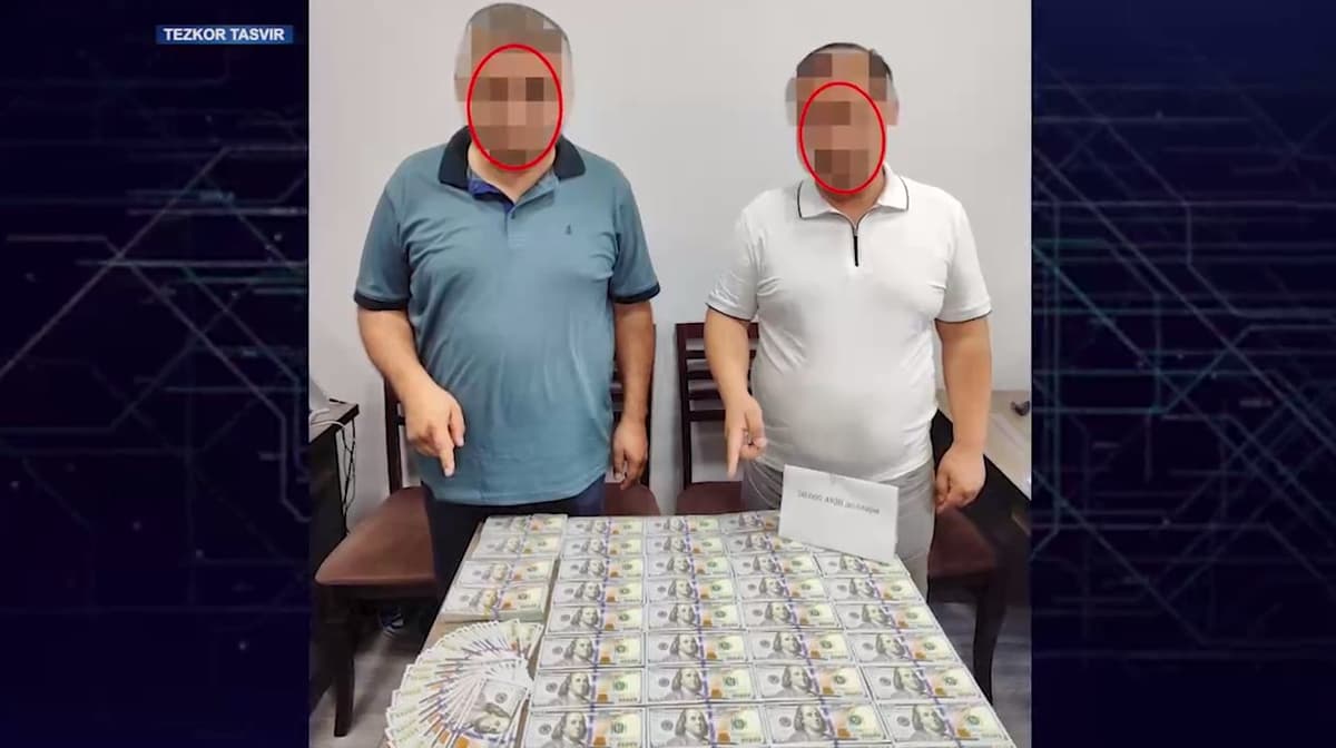 Two lawyers in Fergana arrested for $50,000 bribe in sentencing case
