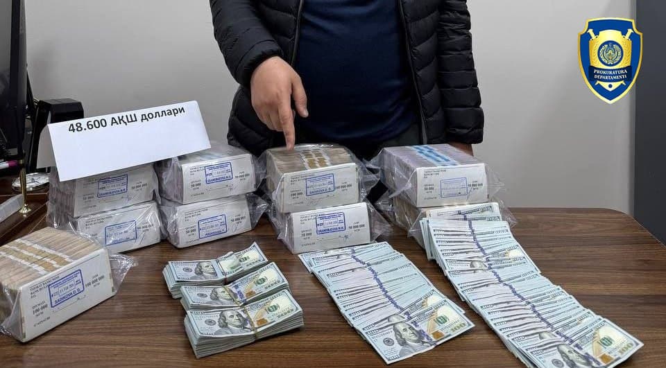Тошкентда 48 минг долларни 600 млн сўмга сотишга уринган фуқаро қўлга олинди