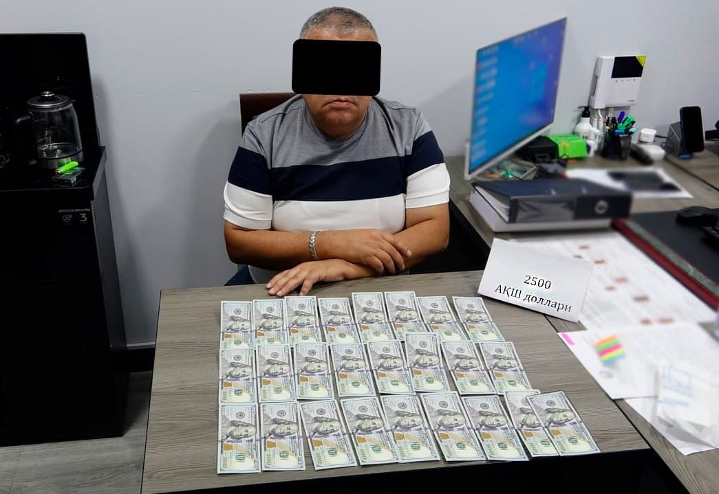 Tashkent police official caught accepting bribe to drop fraud and workplace accident cases