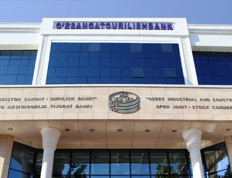 Fitch Ratings “O’zsanoatqurilishbank” reytingini bir pog‘ona oshirdi