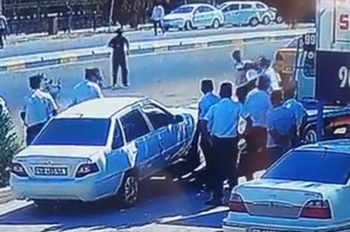 Qarshida yuz bergan mojaroda birinchi haydovchi YPX xodimini tepib kuch ishlatgani ma'lum bo‘ldi