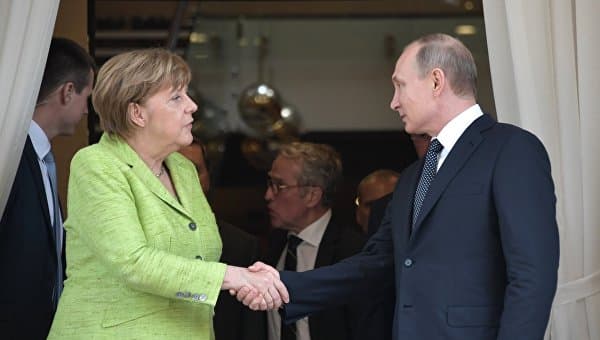 Putin va Merkel Minsk kelishuvlari amalga oshirilishi oqsayotganini qayd qilishdi