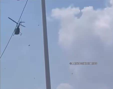 Detroytda vertolyotdan pul sochildi
