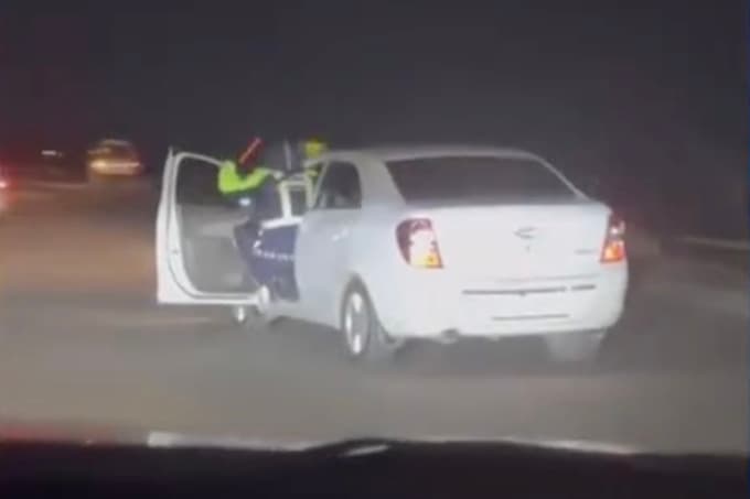 Samarqandda yana bir haydovchi YPX xodimini mashinasida sudrab ketdi