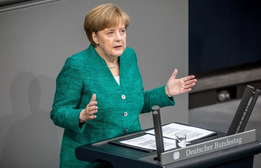 Merkel AQSh bojlarini noqonuniy deb atadi