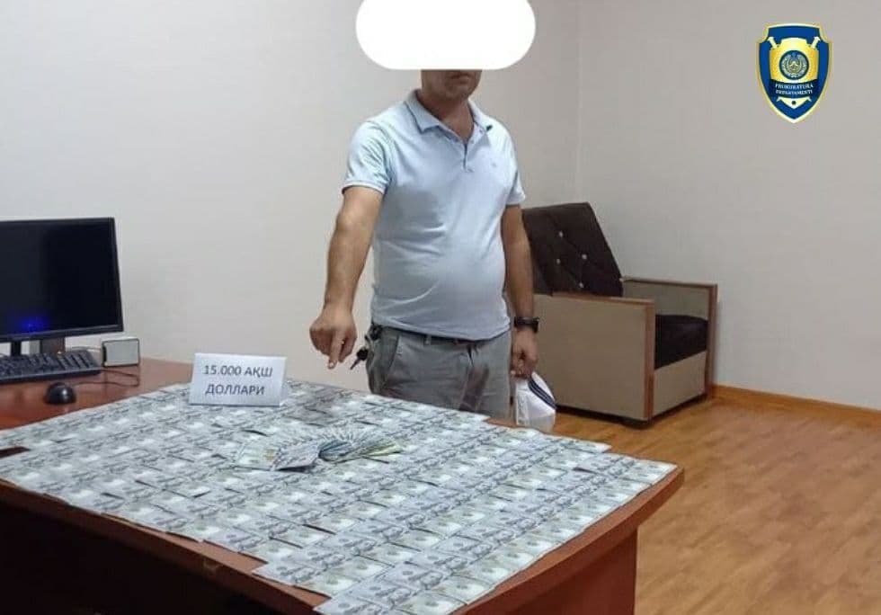 Andijon viloyatida tadbirkorga auksion savdolarisiz bino olib berishni va'da qilgan sobiq mutaxassis ushlandi