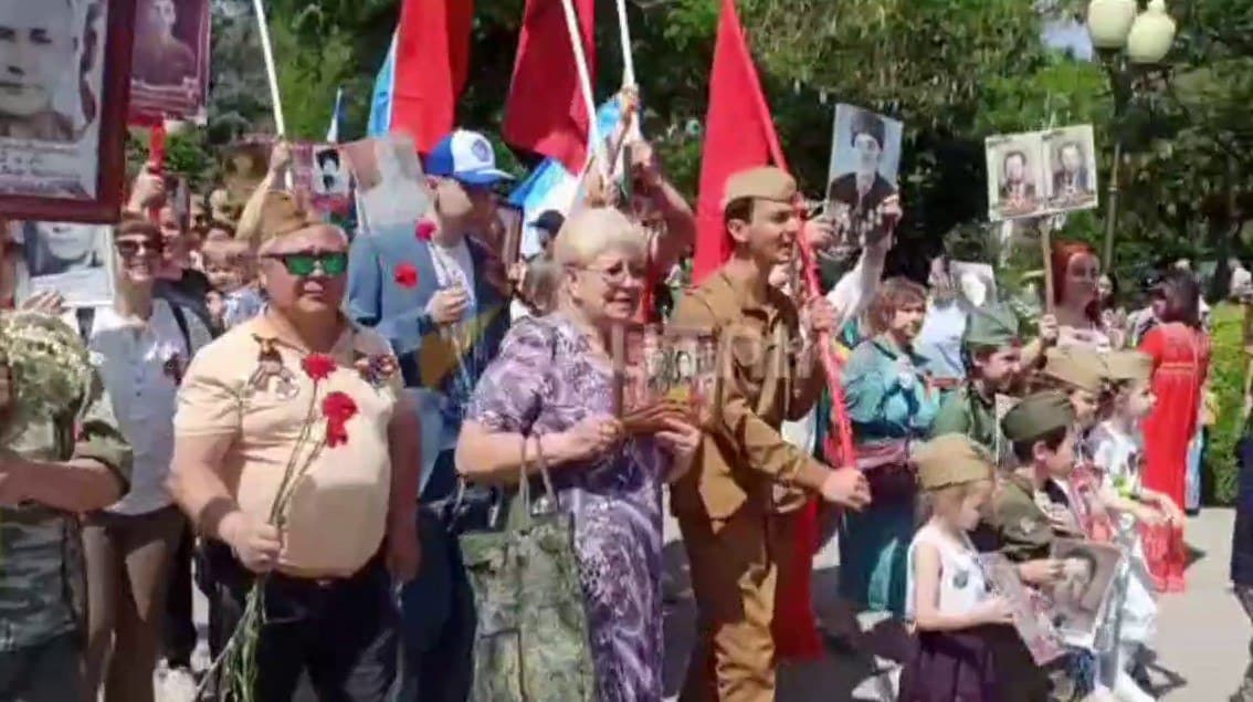 A march took place in Tashkent under USSR flag